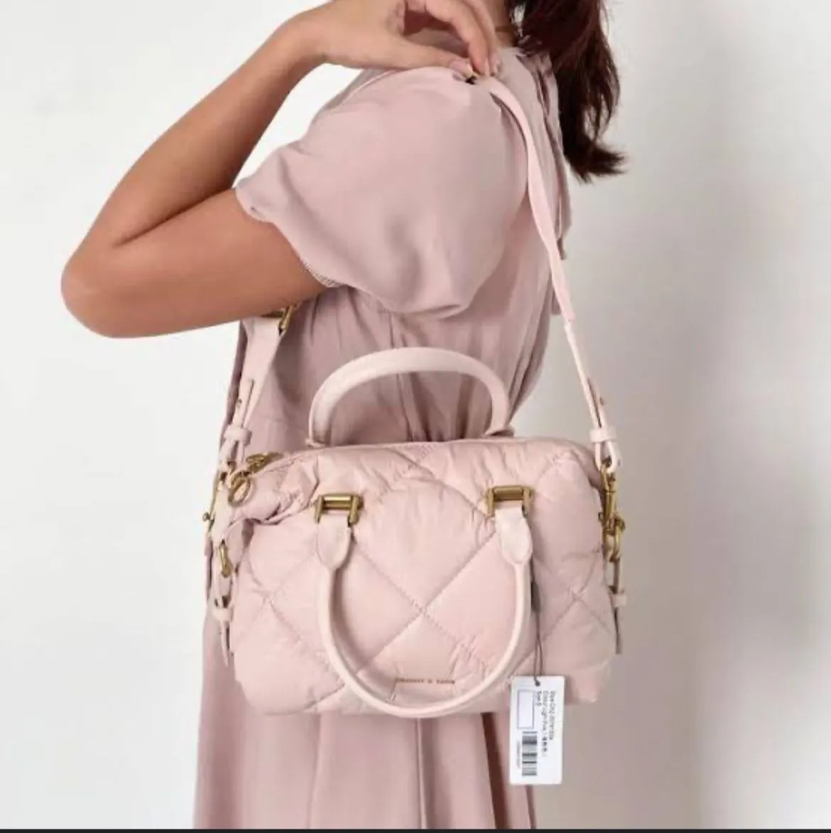 CHARLES & KEITH Women's Master Quality Handbag in Pink with Brand Accents